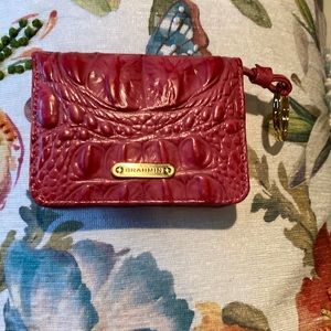 Brahmin travel wallet with key ring. Excellent condition. No flaws.